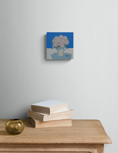 White Roses with a Blue Background