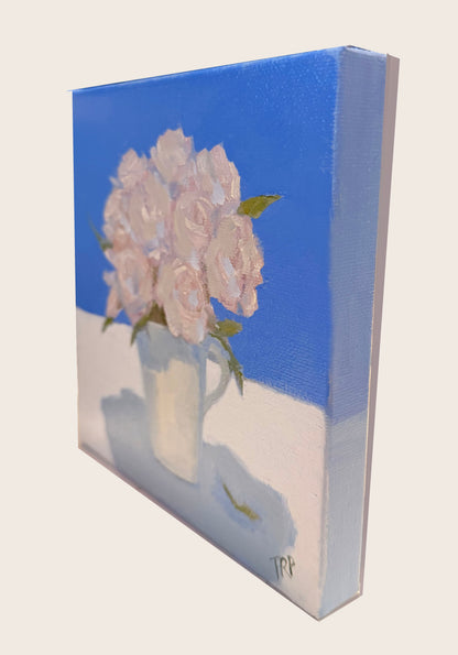 White Roses with a Blue Background